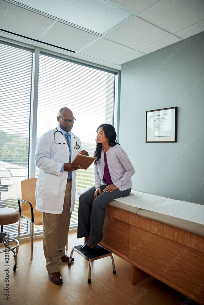 Doctor speaking with female patient Doctor speaking with female patient