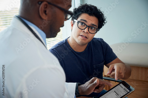 Doctor speaking with patient