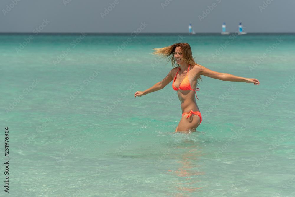 Blonde girl on the Varadero beach, Cuba.