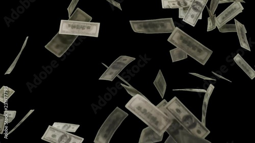 Real slow motion shoot of falling banknotes of DOLLARS. Isolated on green with alpha.