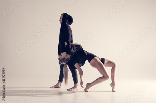 sensual dancers woman and man in sexy clothes