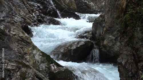 Mountain waterfall in bavaria, slow moution photo