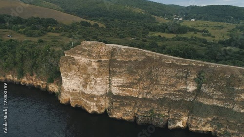 Aerial view on Aerial birds eye drone view from the cliffs photo