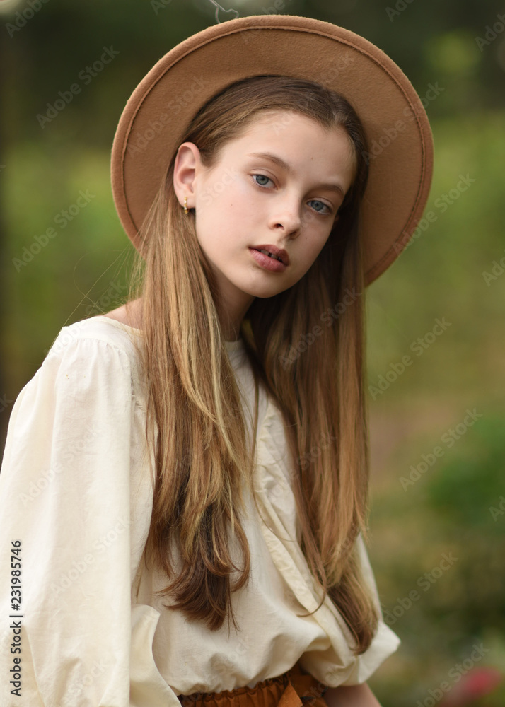 portrait of a fashion model girl in nature