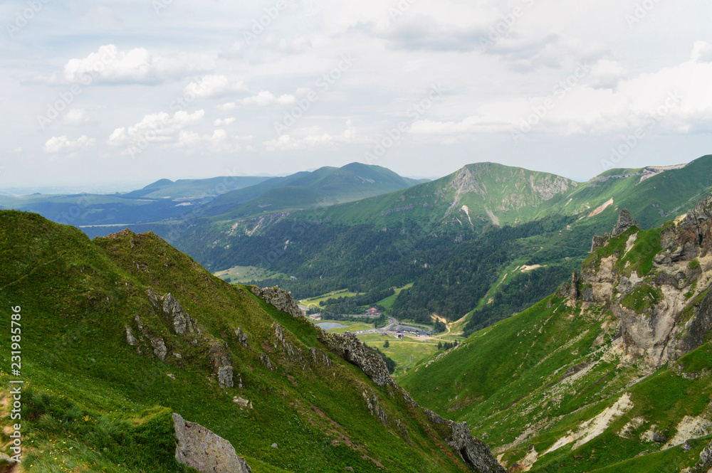 A magnificent panorama from the mountain range of Sancy, in Auvergne, France. National Park of the Auvergne volcano