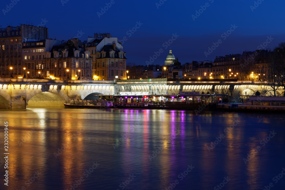 Paris, France - February 18, 2018: View of Pont Neuf, old bridge in Paris by night