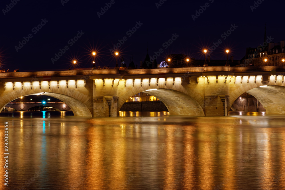 Paris, France - February 18, 2018: View of Pont Neuf, old bridge in Paris by night