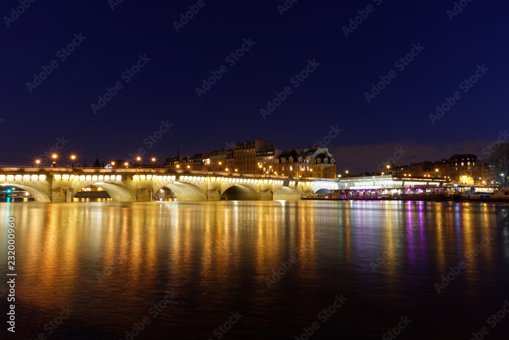 Paris, France - February 18, 2018: View of Pont Neuf, old bridge in Paris by night