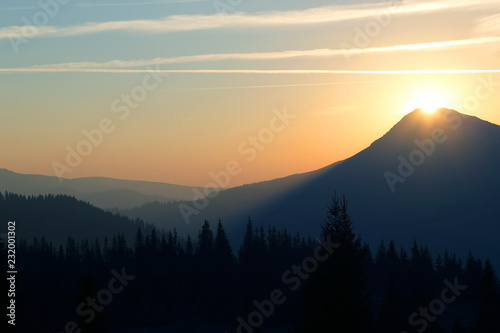 juicy sunrise on top of a mountain