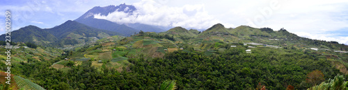 Panorama of Mount Kinabalu with morning cloud mist. Mount Kinabalu in Sabah Malaysia is one of UNESCO World Heritage site in South East Asia.