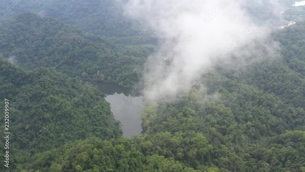 Mountain fog floated above a lake,Taoyuan city, taiwan, Asia Mountain fog floated above a lake,Taoyuan city, taiwan, Asia