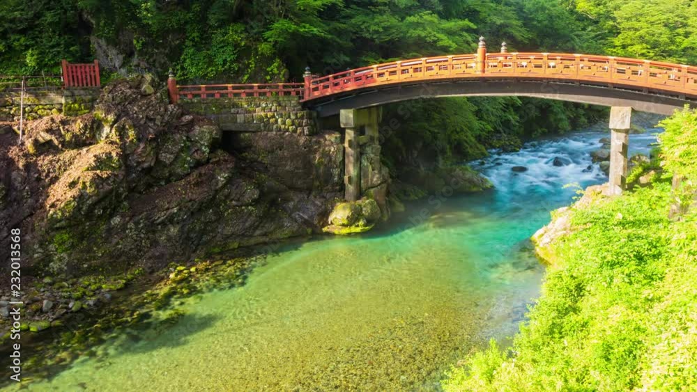 A beautiful morning gorge mist shooting through arch of the Unesco World Heritage Shinkyo Sacred Bridge above the Daiya River with nobody present in Nikko, Japan. Panning 4k time-lapse at 30fps A beautiful morning gorge mist shooting through arch of the Unesco World Heritage Shinkyo Sacred Bridge above the Daiya River with nobody present in Nikko, Japan. Panning 4k time-lapse at 30fps
