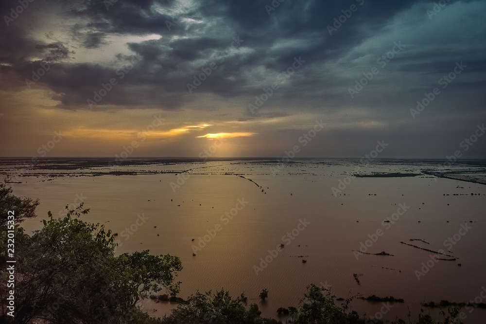 Fototapeta premium golden sunset with reflections on the lake