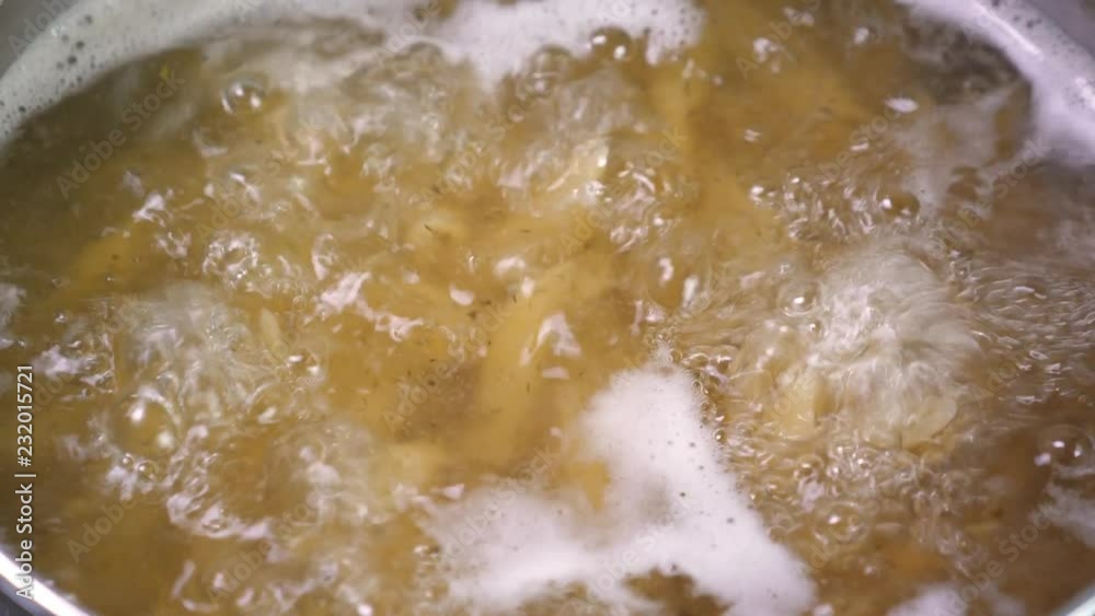 Boiling pasta in pan, cooking macaroni Boiling pasta in pan, cooking macaroni
