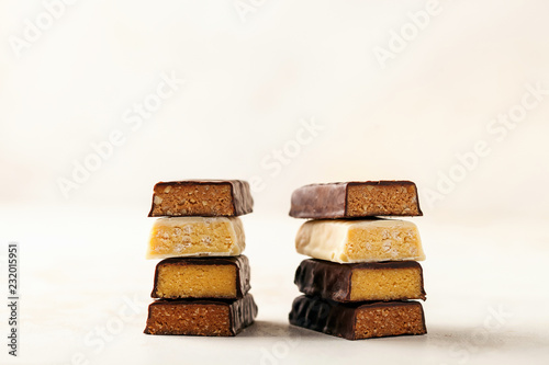 Different Energy protein bar on light background. photo