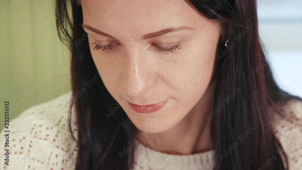 Close-up face of young attractive girl drawing pictures. Close-up face of young attractive girl drawing pictures.