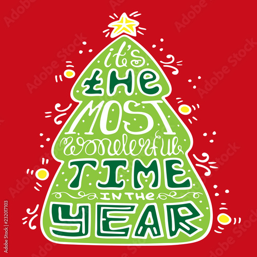 Seasonal handdrawn lettering in the Christmas tree. It is the most wonderful time in the year.