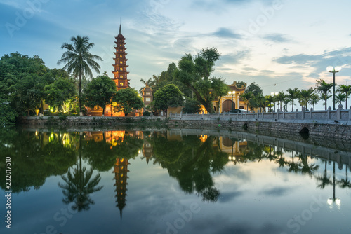 Tran Quoc pagoda during sunset time, the oldest temple in Hanoi, Vietnam. Hanoi cityscape.