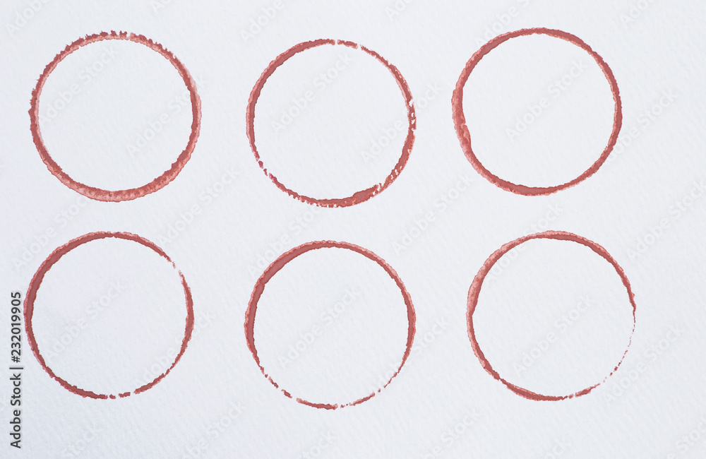 Watercolor paint brow circle on white paper texture background, coffee stain on white background Watercolor paint brow circle on white paper texture background, coffee stain on white background
