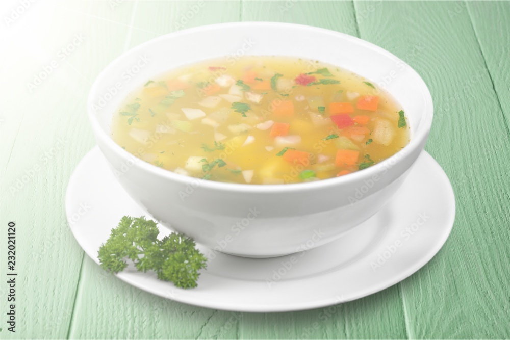 Vegetable soup isolated on a white background