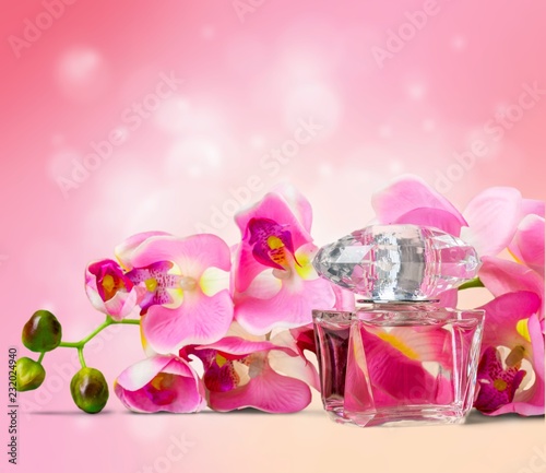 Women's perfume in bottle isolated