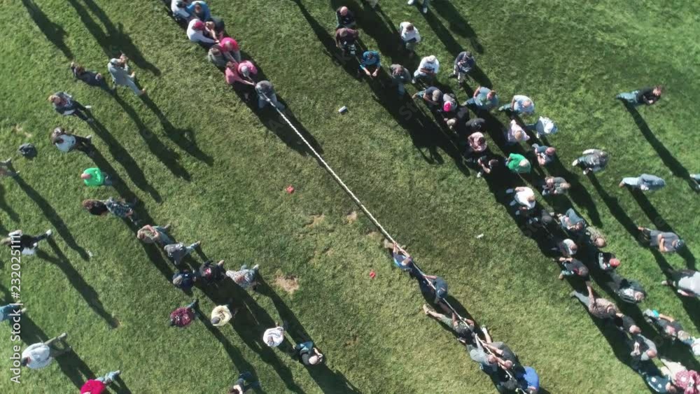 Aerial View of Large Teams Playing Tug O' War