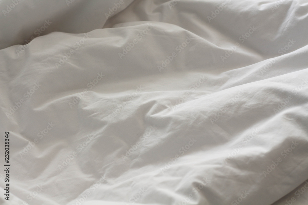 White blanket messy after wake up. White blanket messy after wake up.