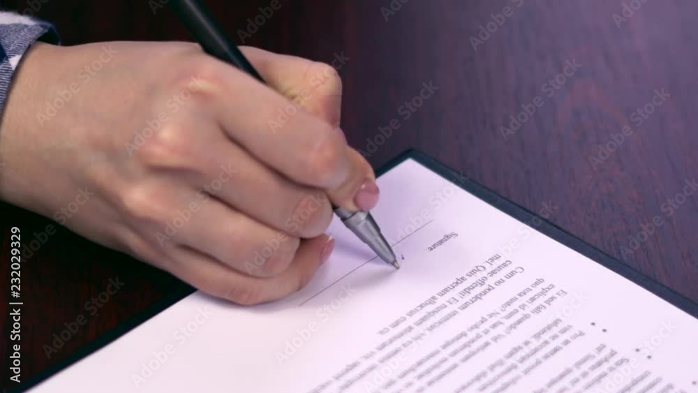 Woman signing contract. Female employee signs rent contract. Beneficial for both sides. Simple clear agreement - fake signature Woman signing contract. Female employee signs rent contract. Beneficial for both sides. Simple clear agreement - fake signature