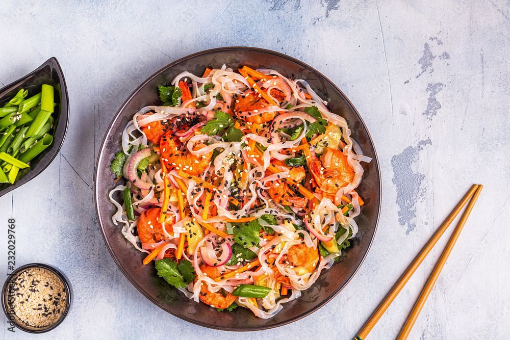 Asian salad with rice noodles, shrimp and vegetables. Asian salad with rice noodles, shrimp and vegetables.