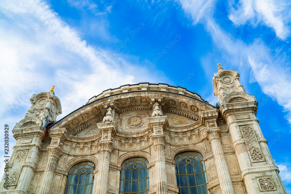 Fototapeta premium ortakoy mosque under the blue sky, old mosque wall, marble wall texture