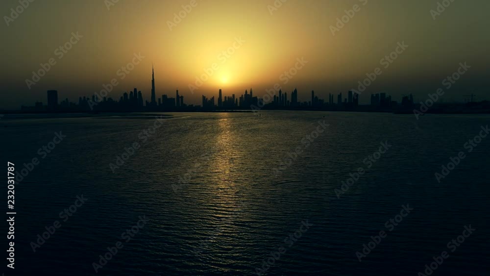 Grading aerial view of Dubai skyscrapers at sunset, UAE. Grading aerial view of Dubai skyscrapers at sunset, UAE.