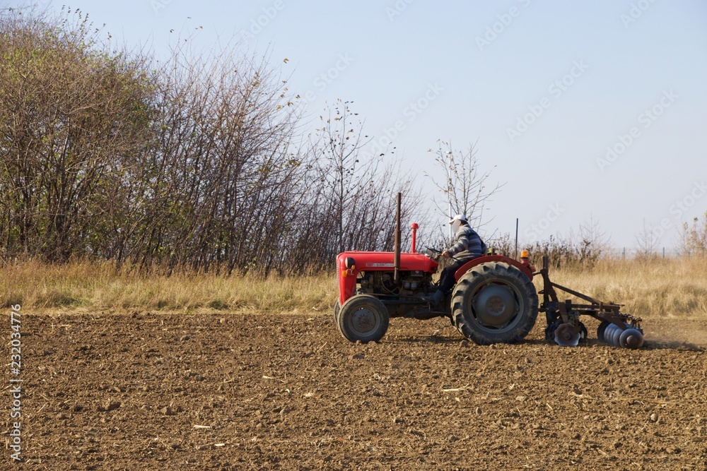 Obraz premium tractor in field 