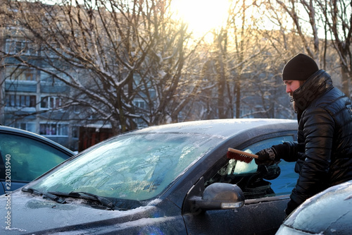 winter man brush car snow © alexkich