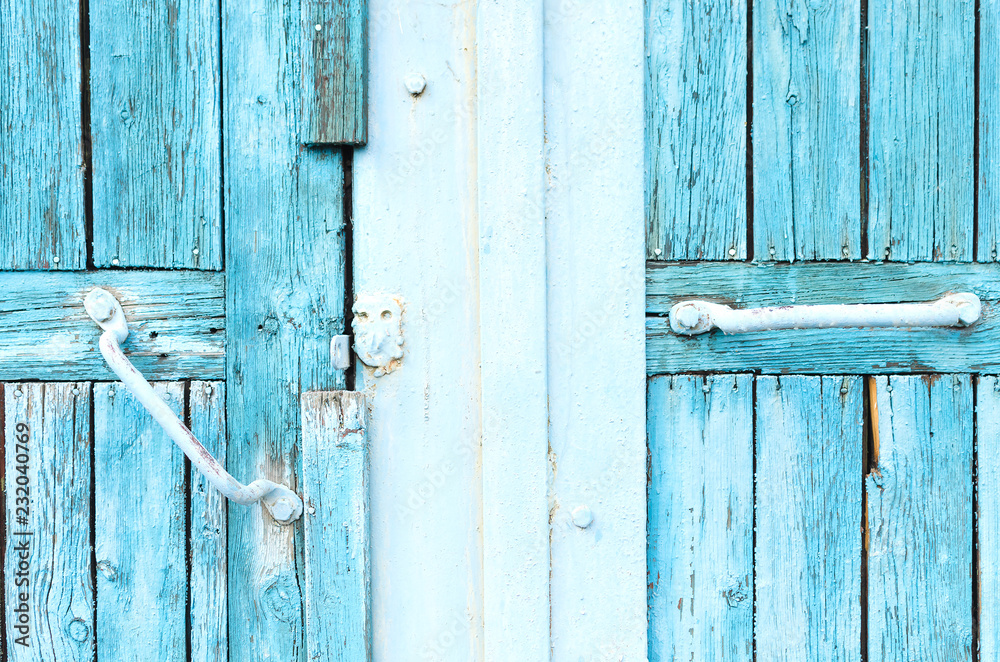 Blue wooden plank door with handle and padlock background.