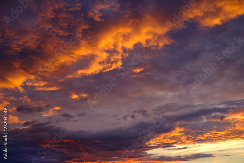 reddish red sunset sky with clouds and clouds © metelevan