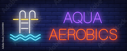 Aqua aerobics neon sign. Glowing inscription with pool stair and water on dark blue brick background. Can be used for fitness, aqua gym, pool aerobics, advertisement