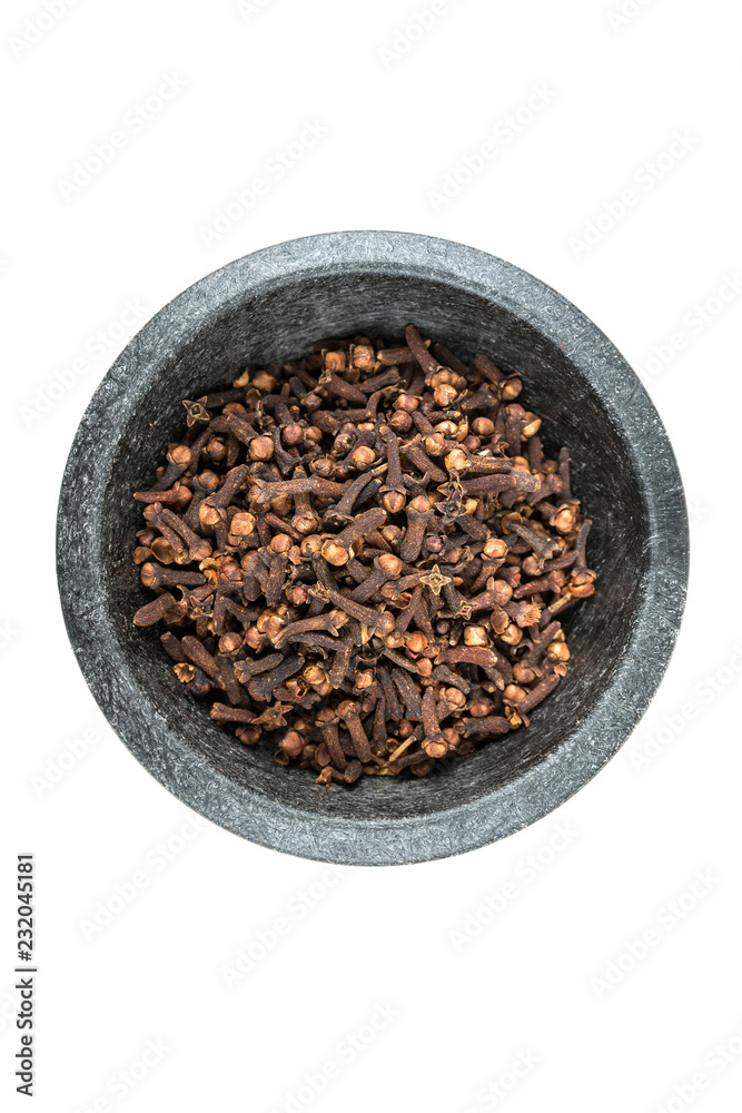 Whole clove heads and pieces isolated over white Whole clove heads and pieces isolated over white