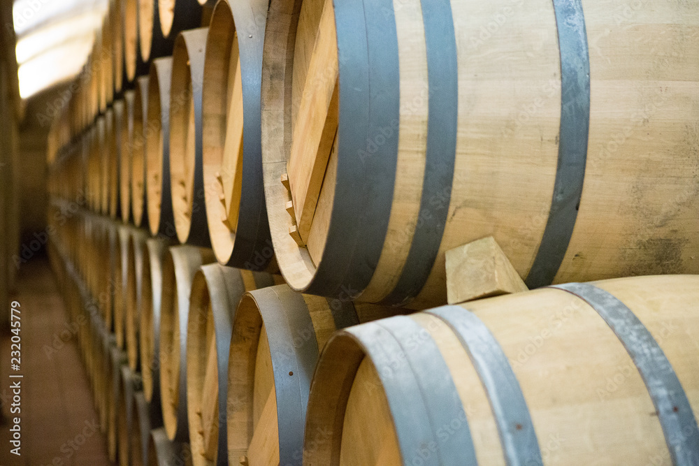 Wooden wine barrels stacked