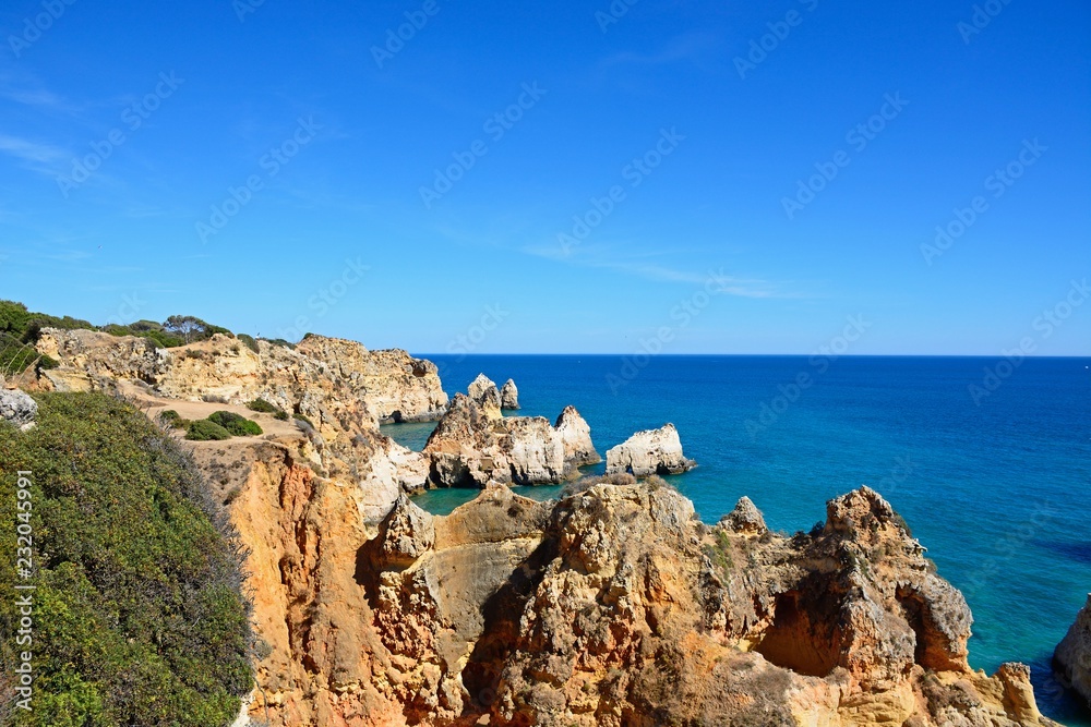 Elevated view of the cliffs with views across the ocean, Praia da Rocha, Portimao, Portugal.