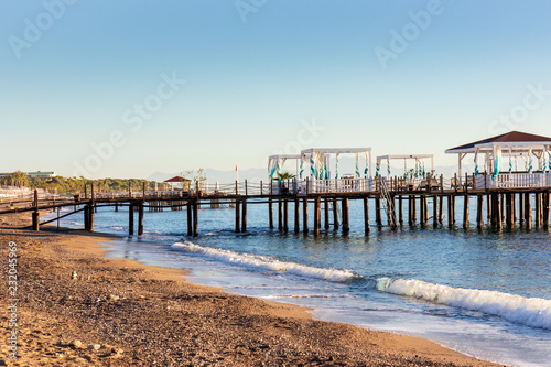  Empty beach  pier  morning  after season  Kemer  Turkey