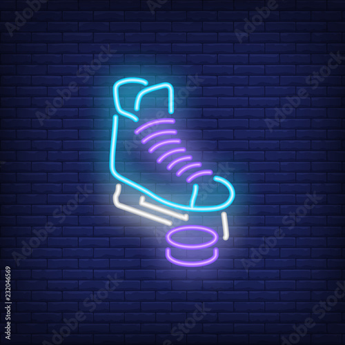 Hockey skate and puck neon sign. Ice hockey advertisement design. Night bright neon sign, colorful billboard, light banner. Vector illustration in neon style.