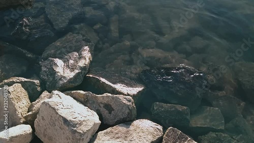 Big stones in the water of Danube. photo