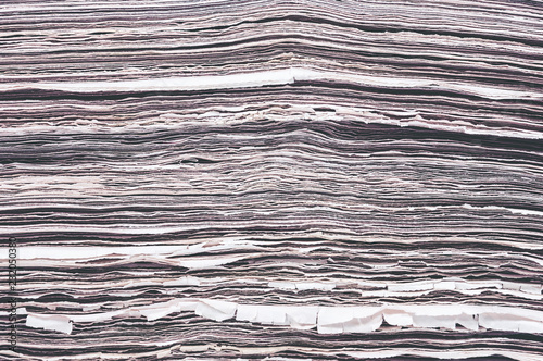 Pile of old newspaper closeup