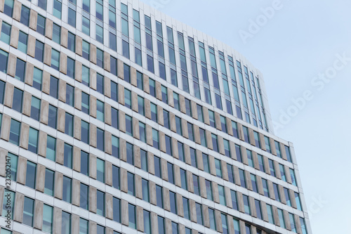 Modern office building against clear blue sky