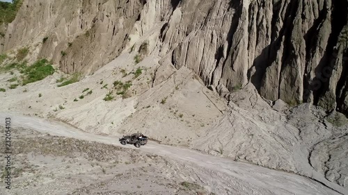 Aerial view of road in valley with a off road jeep in Tarlac, Philippines. photo