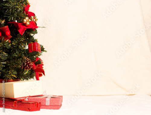 Christmas tree on light background. New Year Card.