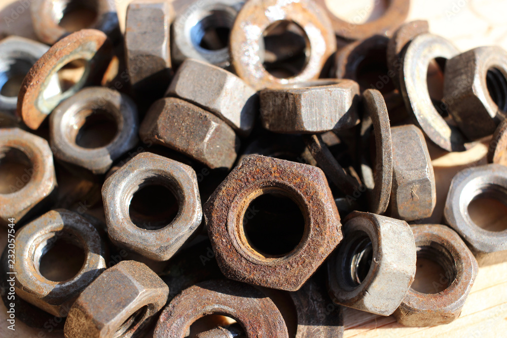 A heap of old rusty nuts. A heap of old rusty nuts.