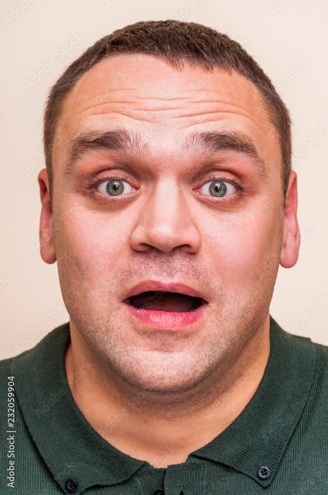 Surprised, shocked, emotional, big eyes man with open mouth. Surprised, shocked, emotional, big eyes man with open mouth.