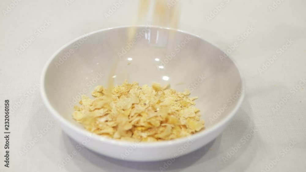 Flakes pour in a white plate Flakes pour in a white plate