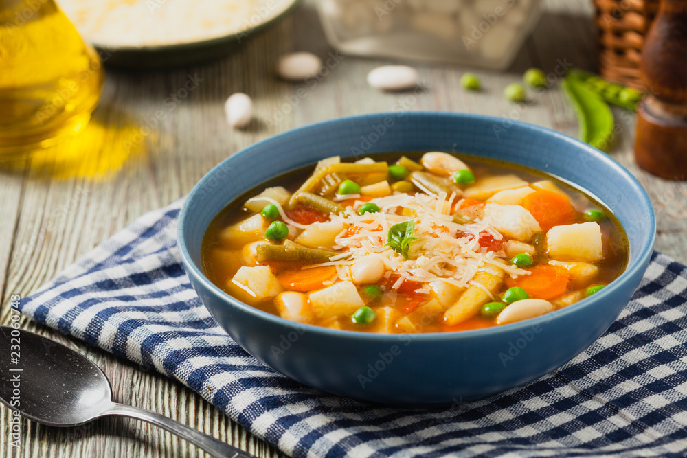 Minestrone soup with pasta and cheese. Minestrone soup with pasta and cheese.